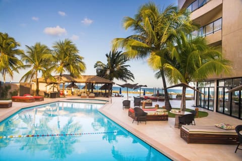 Outdoor pool, pool umbrellas, sun loungers
