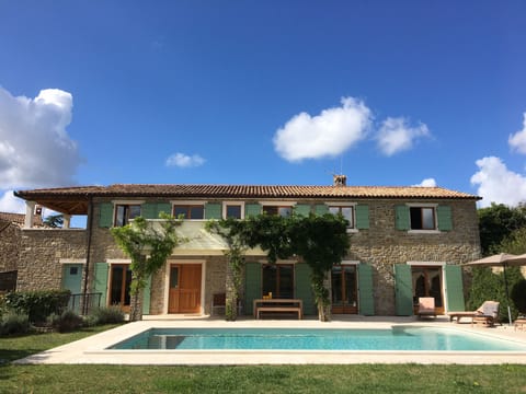The front of the house showing the pool
