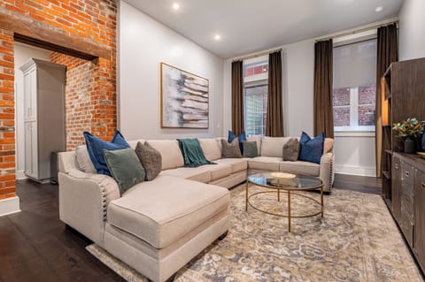 Open concept living and dining area with comfortable seating for you and your guests. 55" Samsung Smart 4K TV for streaming from apps, along with the DIRECTV Entertainment. Lounge on the extra-large sectional after an activity filled day in NOLA!