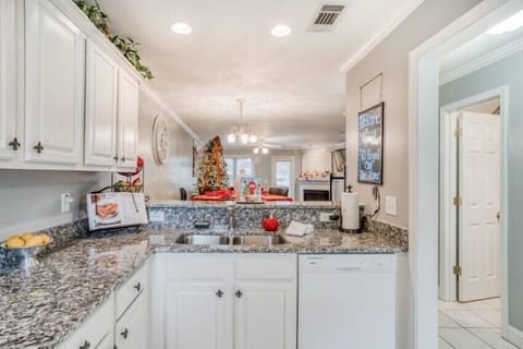 Single door oven, new dishwasher, microwave, refrigerator and granite counter