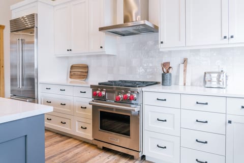 Fully-stocked kitchen with state-of-the-art Wolf Range. 