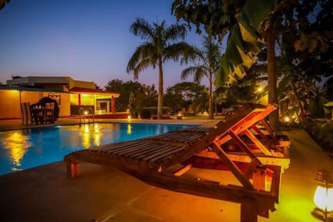 Outdoor pool, open 7:00 AM to 7:00 PM, sun loungers