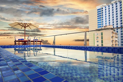 Outdoor pool, open 5:00 AM to 6:00 PM, pool umbrellas, sun loungers