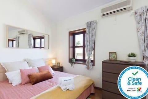 This comfy bedroom let's you have a great night of sleep with two single beds that can be turned into one.
