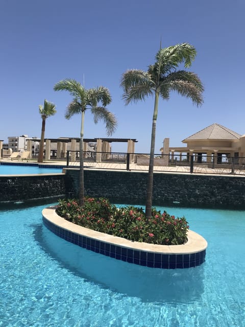 2 outdoor pools, an infinity pool