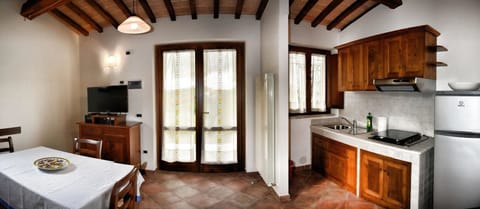 Apartment, 1 Bedroom (Erbaio) | Living area | 32-inch LED TV with satellite channels, TV