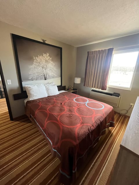 Blackout drapes, iron/ironing board, rollaway beds, free WiFi