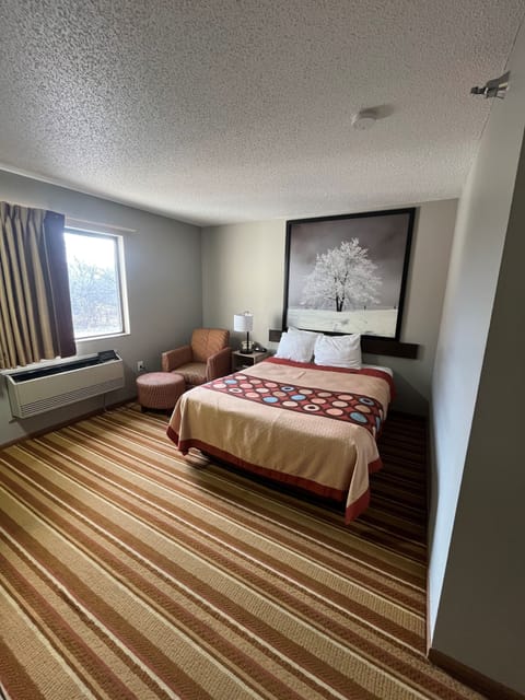 Blackout drapes, iron/ironing board, rollaway beds, free WiFi