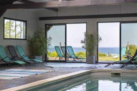 Indoor pool, open 7:00 AM to 10:00 PM, sun loungers