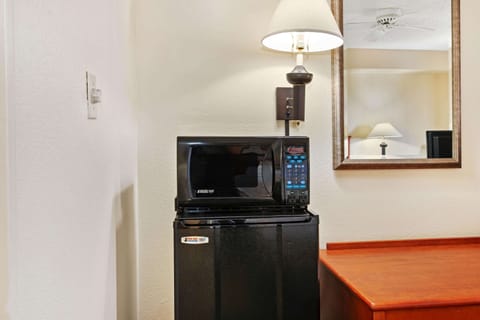 Premium bedding, desk, laptop workspace, iron/ironing board