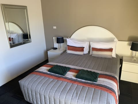 Blackout drapes, iron/ironing board, WiFi (free), bed sheets