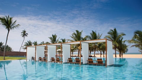 2 outdoor pools, pool umbrellas, sun loungers