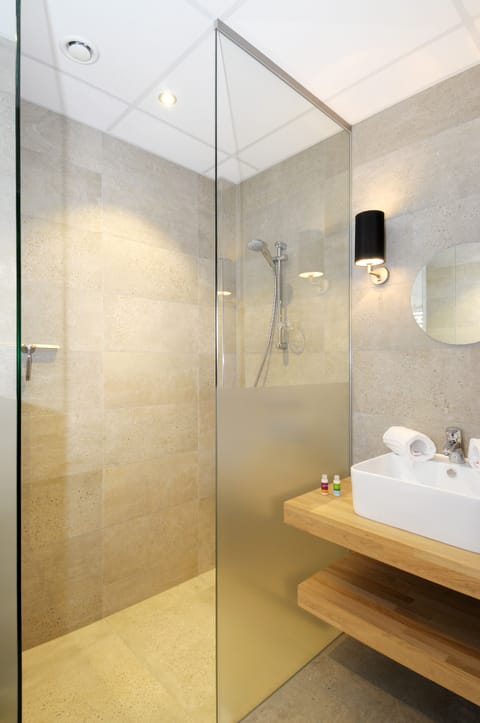 Separate tub and shower, hair dryer, towels, soap