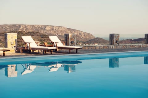 Outdoor pool, open 9:00 AM to 7:00 PM, pool umbrellas, sun loungers