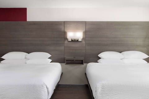 Pillowtop beds, desk, laptop workspace, blackout drapes
