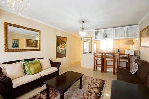 Apartment, 2 Bedrooms | Living room | Flat-screen TV