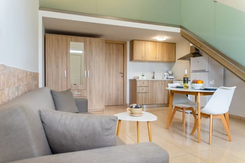 Deluxe Loft (Duplex, 2 Persons) | Living area | Flat-screen TV