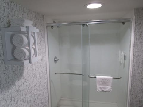 Suite, 1 King Bed, Non Smoking (with Sofabed) | Bathroom | Free toiletries, hair dryer, towels, soap