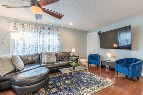 Living 1: Huge 75" Roku TV in lower living room