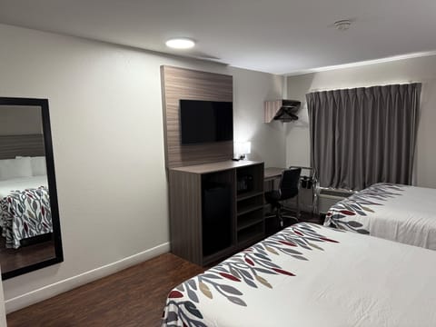 Deluxe Room, 2 Queen Beds, Non Smoking | Desk, laptop workspace, blackout drapes, free cribs/infant beds