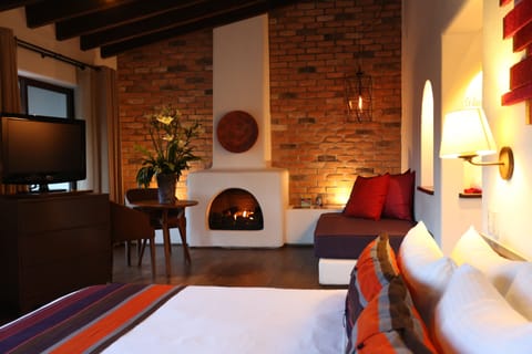 Junior Suite | Down comforters, in-room safe, individually decorated