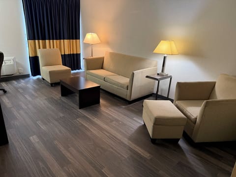 Suite, 1 King Bed, Non Smoking, Jetted Tub | Living area | LED TV