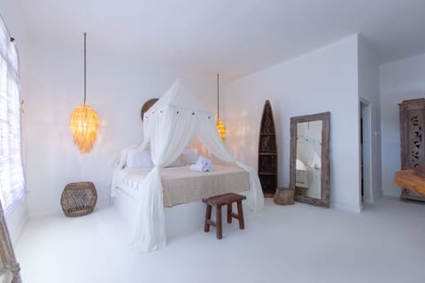 Suite, Pool View | Minibar, in-room safe, individually decorated, soundproofing