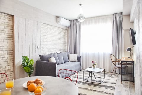 Walk Ancient Athens from this 1BDR near Acropolis! from this 1BDR near Acropolis | Living room | 28-inch Smart TV with digital channels, TV