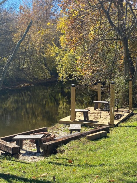 Enjoy the new deck and firepit area by the natural inlet pond!!  Nature’s finest