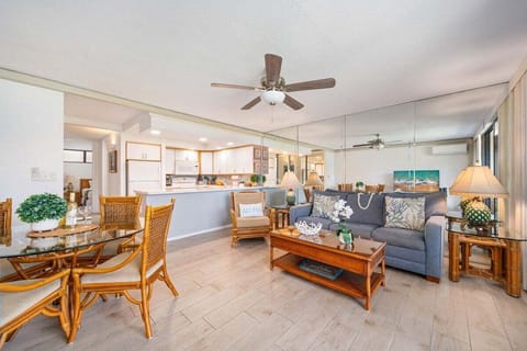 Dine in a bright space framed by glass and greenery.