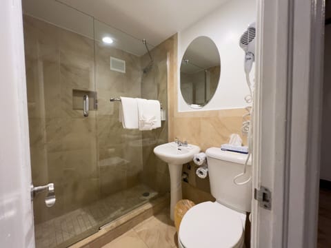 Shower, designer toiletries, hair dryer, bathrobes