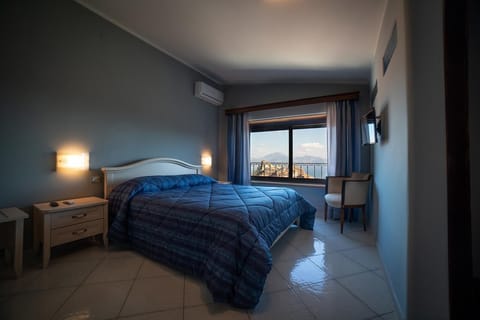 Panoramic Triple Room, Sea View | Minibar, desk, free WiFi, bed sheets