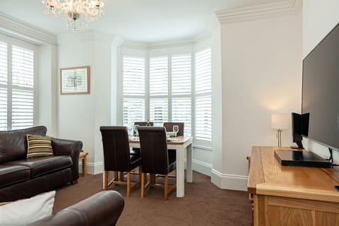 Comfort Apartment | Living area | TV