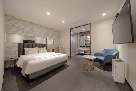 Deluxe Room, Non Smoking, City View | Free minibar, desk, laptop workspace, blackout drapes