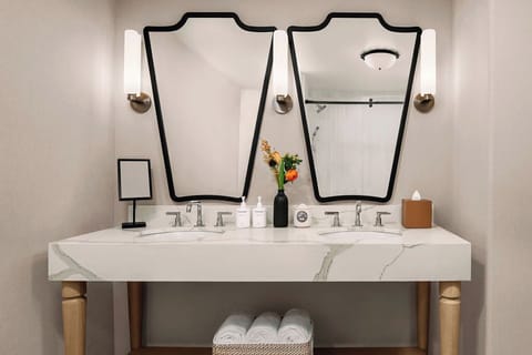 Designer toiletries, hair dryer, bathrobes, towels