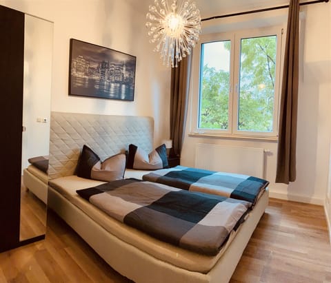 Exclusive Apartment, 2 Bedrooms, Ground Floor | 2 bedrooms, iron/ironing board, free WiFi, bed sheets