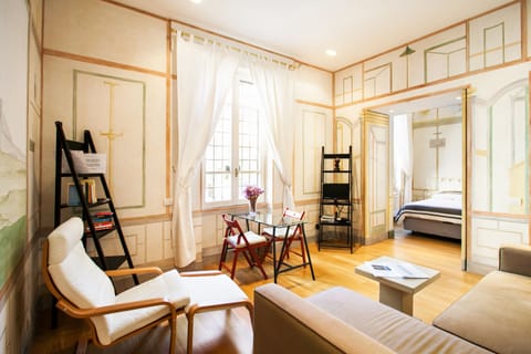 Apartment, 1 Bedroom | Living room | Flat-screen TV
