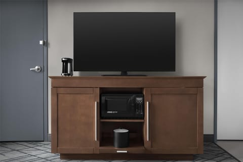 Desk, blackout drapes, iron/ironing board, free cribs/infant beds