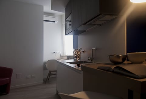 Fridge, stovetop, electric kettle, toaster