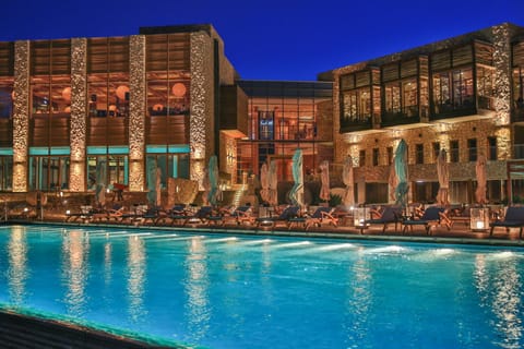 Indoor pool, seasonal outdoor pool, pool umbrellas, sun loungers