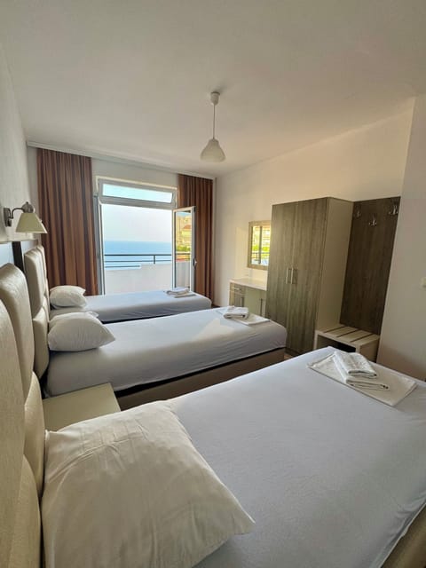 Premium Apartment, 2 Bedrooms, Beach View | Pillowtop beds, desk, iron/ironing board, free WiFi