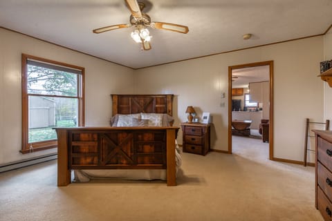 Bedroom features reclaimed wood furniture, from the Youngstown Sheet and Tube.
