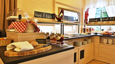 Daily buffet breakfast (EUR 13 per person)