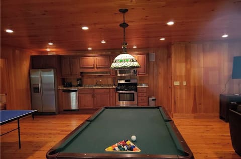 pool table in gameroom with kitchenette