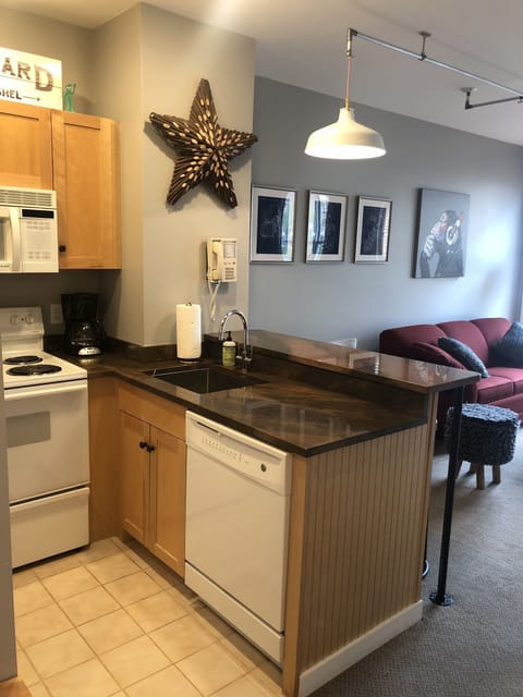 Kitchen area looking into living room