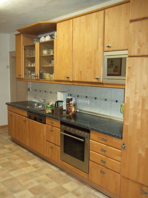 Standard Townhome | Private kitchen | Shared fridge, microwave