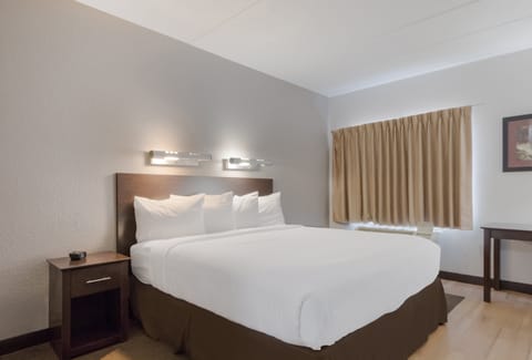 Suite, 1 King Bed, Non Smoking | Blackout drapes, iron/ironing board, free cribs/infant beds, free WiFi