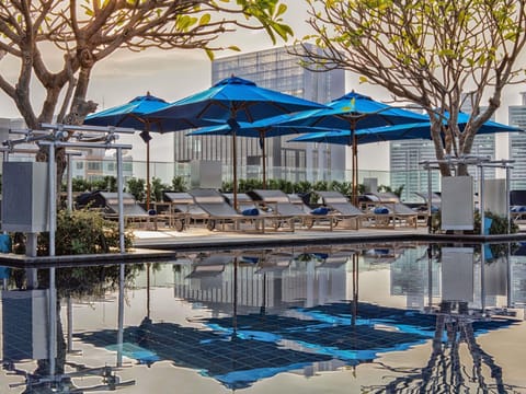 Outdoor pool, pool umbrellas, sun loungers