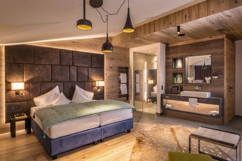 Design Suite | Premium bedding, in-room safe, individually decorated, desk