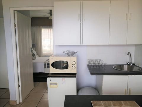 Oestervanger Self catering | Private kitchenette | Mini-fridge, microwave, coffee/tea maker, toaster